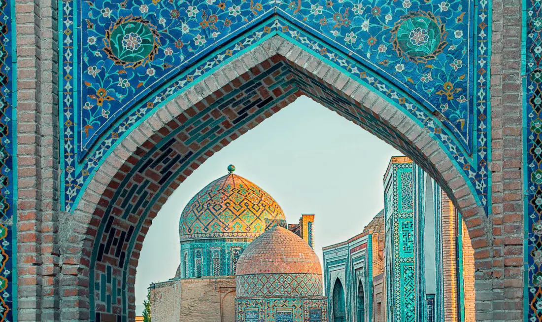 Shah-i-Zinda in Samarkand, Uzbekistan, framed by a tiled arch